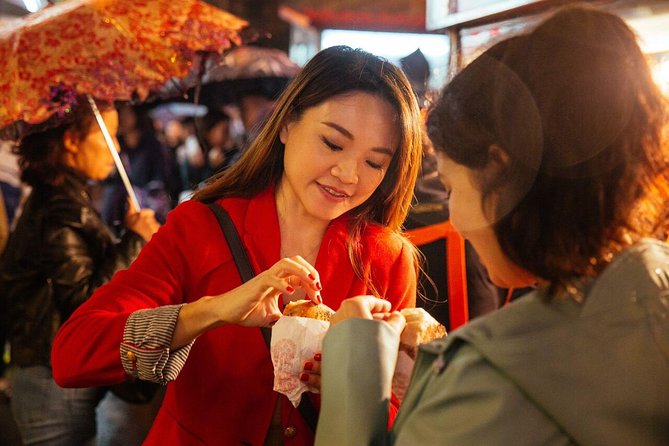 A Magical Evening in Taipei: Private City Tour - Songshan Ciyou Temple after dark