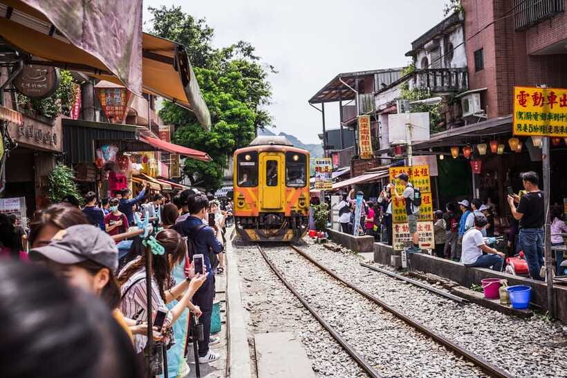 From Taipei: Shifen, Jiufen, and Yehliu Guided Day Trip - Jiufen Old Street, stairs, snacks, and old architecture