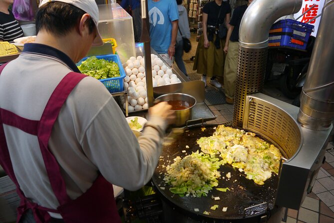 Local Favorites: Taiwan Night Market Food Tour in 2 hours - Entering Ningxia Night Market After Dark