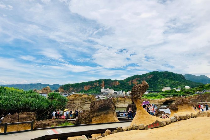 One-day private chartered car tour in Taipei: Yehliu, Jiufen, Pingxi, North Coast popular attractions with chartered car, professional Chinese/English driver - Shifen Old Street: trains, lanterns, and a busy little ritual