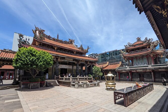 Private Longshan Temple and Dadaocheng Walking Tour - Entering Dadaocheng through old commercial streets