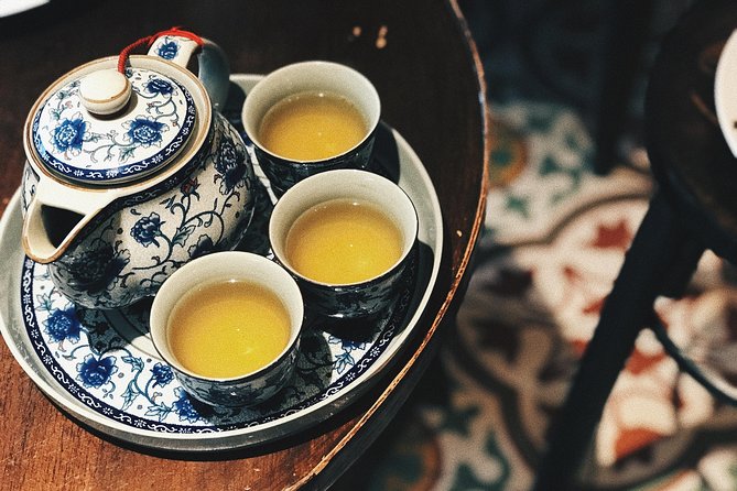 Sip & Savor: Maokong Tea & Shenkeng Stinky Tofu Private Day Tour - Riding the Maokong Gondola above Taipei