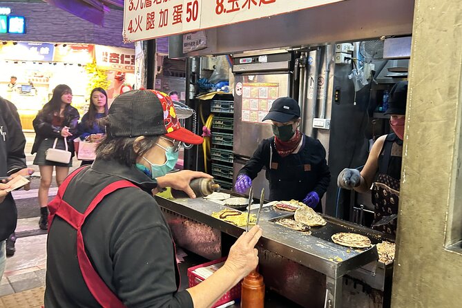 Taipei Hidden Eats, Market & Street Food Tour with 8+ Tastings - Shida Night Market after dark