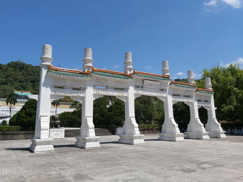 Taipei: Morning City Tour with National Palace Museum Entry - The vehicle, pickup, and pace