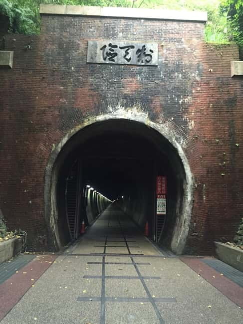 Taipei Private Spiritual Tour with Afternoon Tea & Cycling - Cycling the Old Caoling Tunnel