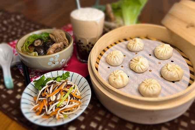 Taiwan Traditional Delicacies Experience, Xiao Long Bao, Chicken vermicelli with mushroom and sesame oil, Tofu strips salad, Bubble milk tea. - Four dishes that show different sides of Taiwan