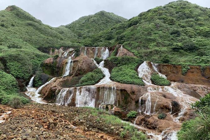 Yehliu, Jiufen & Shifen Taiwans North Coast Day / Night Tour - Shifen Waterfall and a change on busy days